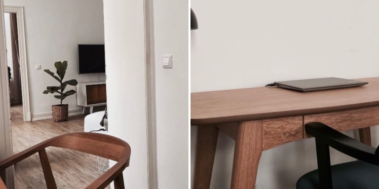 Dark wooden chair with in the background a plant, tv and sideboard. Dark wooden desk with laptop on top and black chair in front